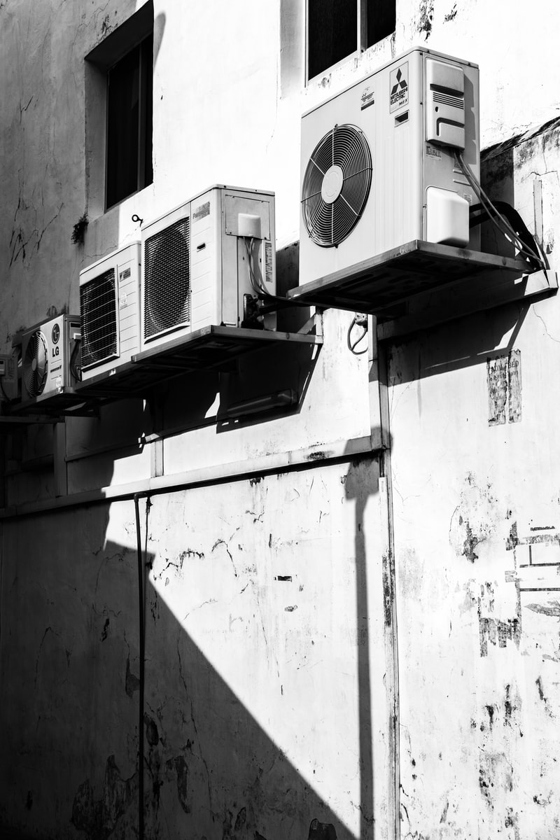 greyscale photography of AC units