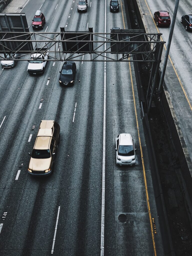 time-lapse photography of traveling cars