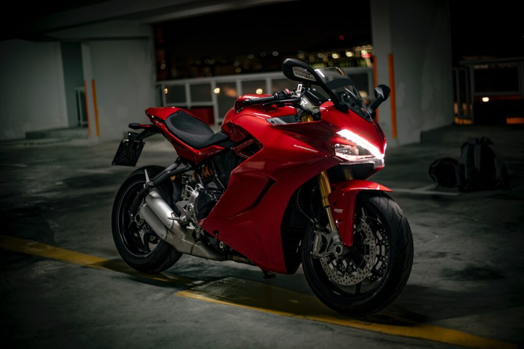 red and black sports bike