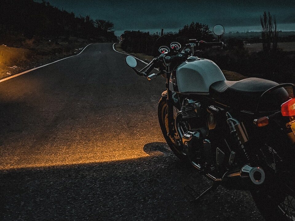 black and silver cruiser motorcycle on road during daytime