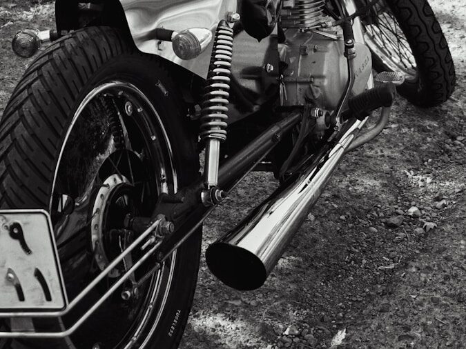 a motorcycle parked on the side of a road