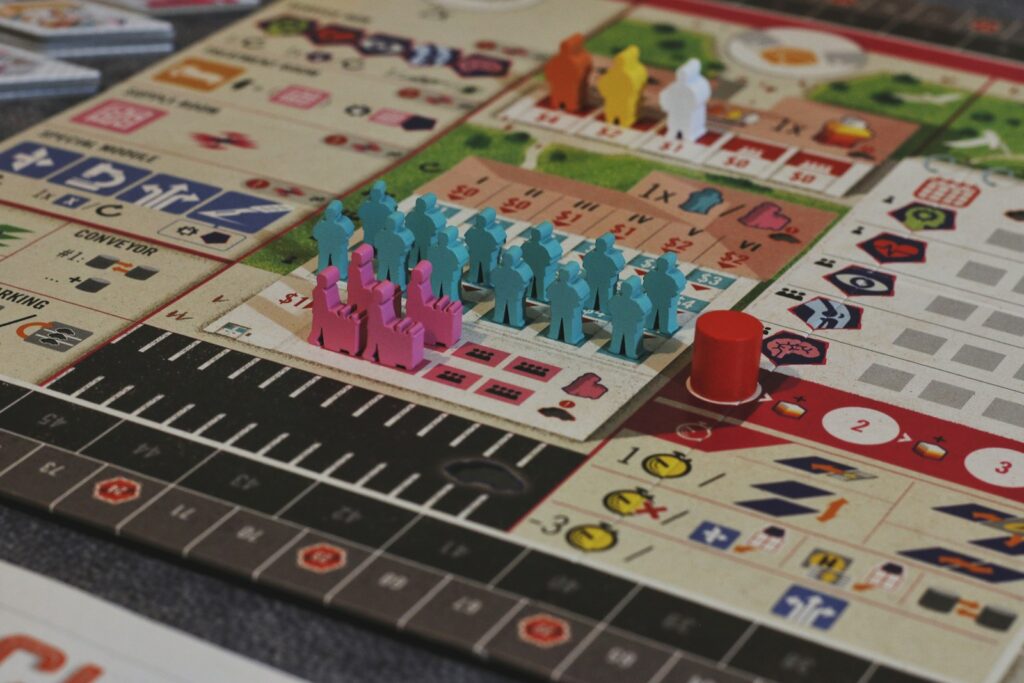 Colorful game pieces on a board game.